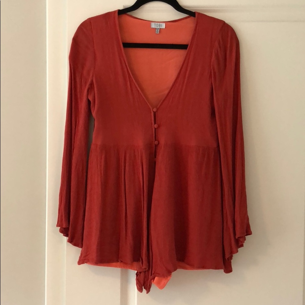 Orange long sleeve romper